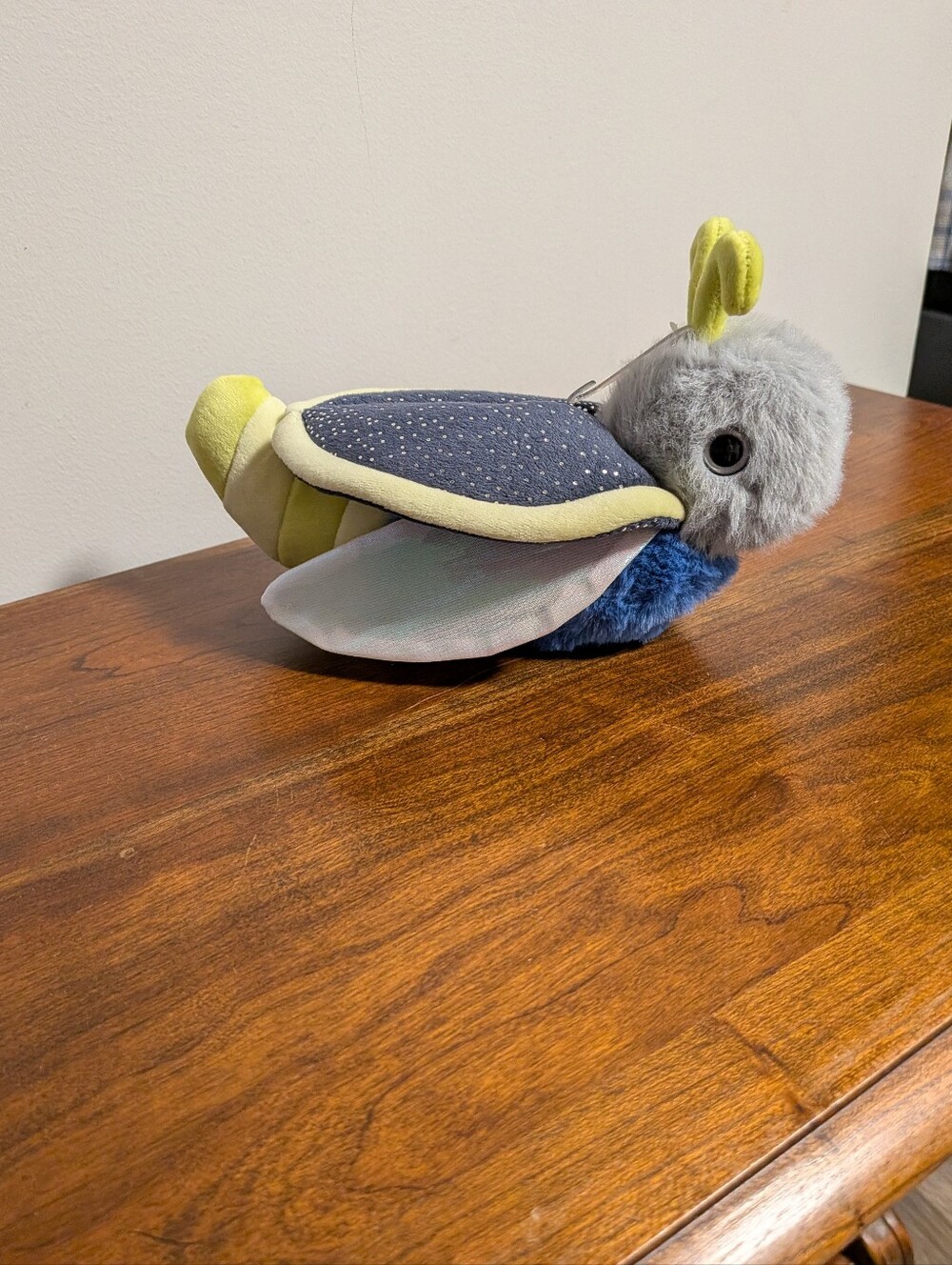 Douglas Cuddle Toy. Plush Firefly - Gray, Blue & Yellow. 8 Inches. NWT